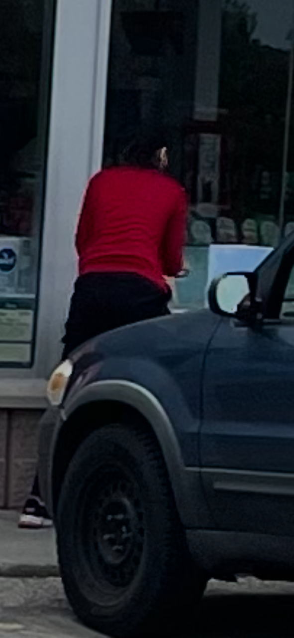 Cashier outside filming